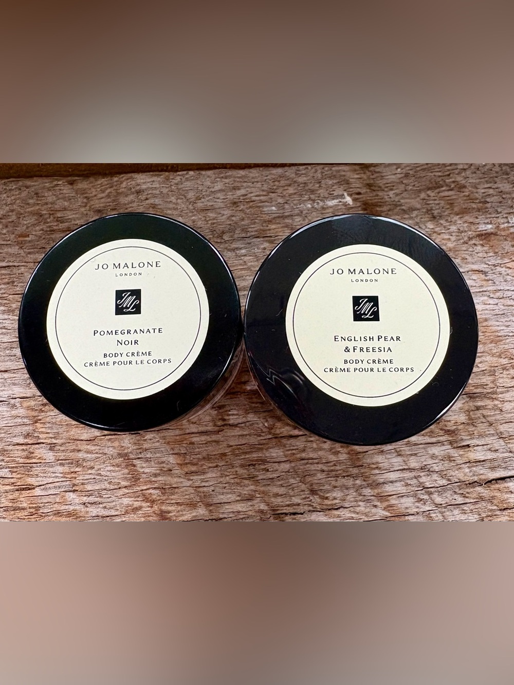 Choose a .5 oz. Jo Malone: Pomegranate Noir or English Pear & Freesia Body Crème